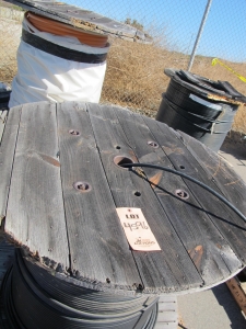 (16 SPOOLS) VARYING SIZES OF TELECOM CABLE. LOADING & HANDLING FEE $30-4596